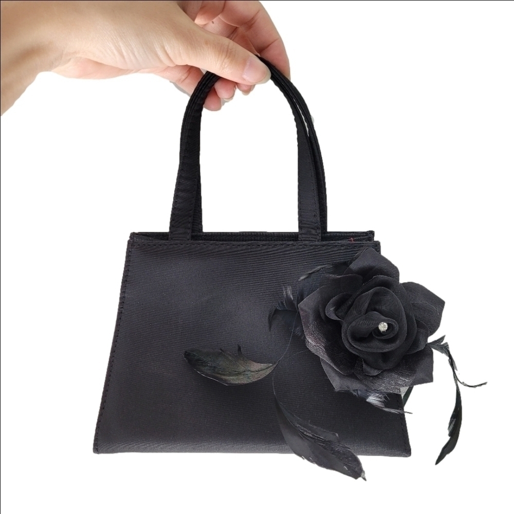 Vintage black mini clutch handbag with detachable black floral accent